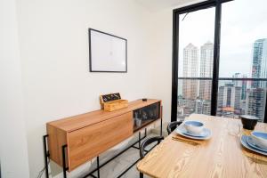 a dining room with a table and a large window at 1BR Amazing sea view in Calle 50 in Panama City