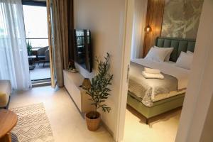 Postel nebo postele na pokoji v ubytování Luxury Palata Penthouse Apartments