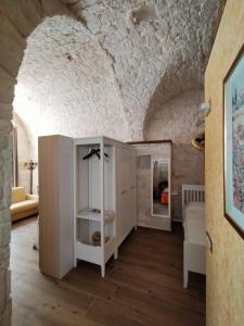 Postel nebo postele na pokoji v ubytování L' Angolo dei Poeti