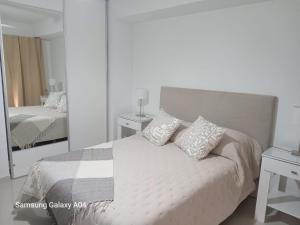 Ένα ή περισσότερα κρεβάτια σε δωμάτιο στο Departamento Confortable