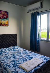 Giường trong phòng chung tại Casa del paseante