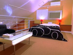 Postel nebo postele na pokoji v ubytování 伊香保の星空