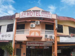 a building with a hotel sign on the top of it at Hotel Rembau in Rembau