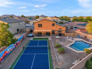 an aerial view of a tennis court in a house at Mirage Peak Manor Luxury Villa Pool Spa Games Hosted by Relaxtay in Casa Grande