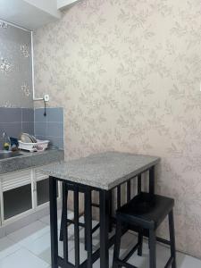 Kuchyň nebo kuchyňský kout v ubytování 2 BR Spacious Loft Apartment