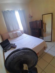 Katil atau katil-katil dalam bilik di Residencial Aracema Para COP30 +3 gambar