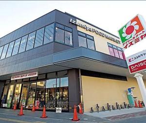 a building with orange cones in front of it at 桜の恋 in Osaka