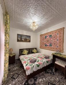 Ένα ή περισσότερα κρεβάτια σε δωμάτιο στο Zardozon Guest House