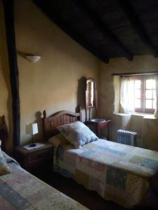 Voodi või voodid majutusasutuse Casa Pepa toas