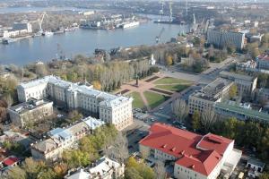 an aerial view of a city with a river and buildings at Apartments on Sobornaya Street near the waterfront in Mykolaiv
