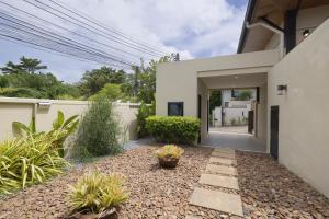 En have udenfor Foxtail Palm Villa