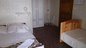 Posteľ alebo postele v izbe v ubytovaní Steinhaus Bed & Breakfast