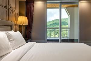 Postel nebo postele na pokoji v ubytování Kensington Hotel Pyeongchang