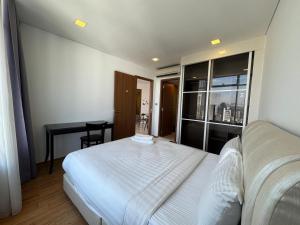 Ліжко або ліжка в номері Vortex Suites KLCC 您的舒適 我們的承諾