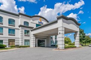 a rendering of a hotel front of a building at Comfort Inn & Suites Grand Blanc-Flint in Grand Blanc