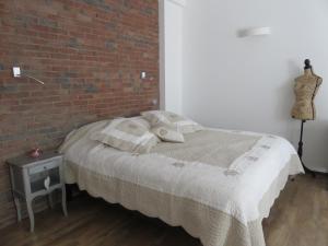 Postel nebo postele na pokoji v ubytování Guesthouse Le Vauban