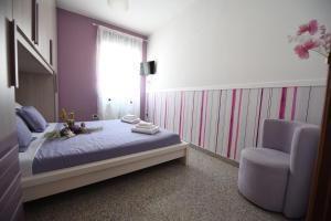 Postel nebo postele na pokoji v ubytování Eden Sassi Matera
