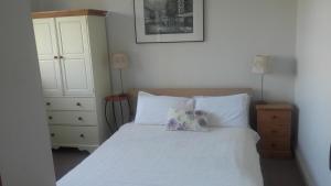 Voodi või voodid majutusasutuse St. Aiden's Guesthouse toas