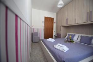 Postel nebo postele na pokoji v ubytování Eden Sassi Matera