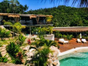 an aerial view of a resort with a swimming pool at SANA Koh Phangan in Salad Beach