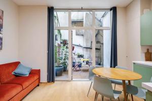 Гостиная зона в Appartement spacieux avec grande terrasse cœur de Valence