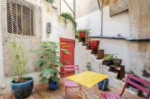 Патио или другая зона на открытом воздухе в Appartement spacieux avec grande terrasse cœur de Valence