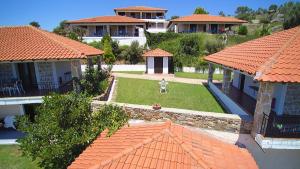 an aerial view of a house with orange roofs at Villas Gemeli in Ammouliani
