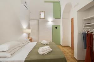 Ένα ή περισσότερα κρεβάτια σε δωμάτιο στο A Casa Di Legnointesta