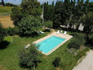 an overhead view of a swimming pool in a yard at Antico Casale Fossacieca in Civitanova Marche