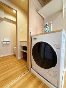 a microwave sitting on top of a room at Rakuyu asakusa in Tokyo +45 photos