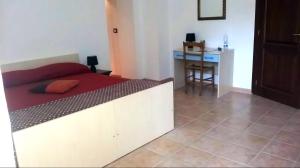 Postel nebo postele na pokoji v ubytování B&B Porta Bazzano