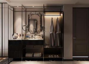 a bathroom with a sink and a mirror at Manevi Premier Hotel in Hanoi +44 photos