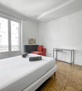 Katil atau katil-katil dalam bilik di Hyper centre Montpellier Appart avec balcon privé