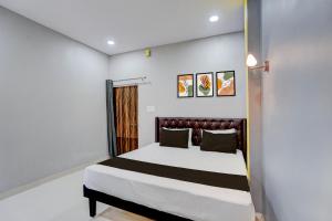 DurgにあるHotel O RIOの部屋にベッドがある寝室