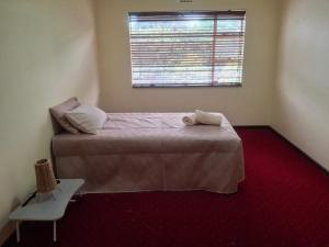 Postel nebo postele na pokoji v ubytování Bhattuta Halaal Mansion + 9 fotografií