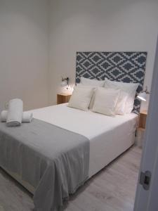 Una habitación en Livemalaga Santa María Apartments