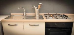 A kitchen or kitchenette at Rome Together Guest House