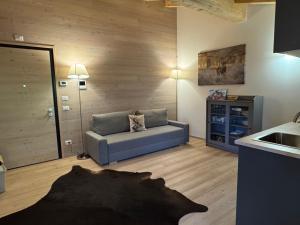 a living room with a couch and a sink at Haus Viki in Sesto
