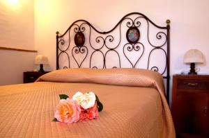 Posteľ alebo postele v izbe v ubytovaní SassoMatto b&b BioAgrituRelax