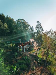 an aerial view of a house on a hill at Chameleon Eco Farm Stay and Cultural Tours in Lushoto