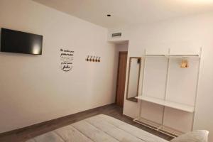 TV a/nebo společenská místnost v ubytování Villa rural el Valle de Aron