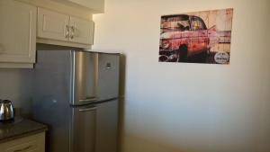 Kuchyň nebo kuchyňský kout v ubytování Apartment Marassi