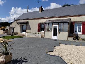 a house with a driveway in front of it at Bel Horizon in Saint-Jean-Froidmentel