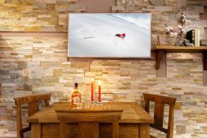 Et tv og/eller underholdning på HelloCHALET Cervinia - Ski-in Ski-out Studio, 200mt at Plan Maison Lift