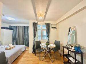 Ένα ή περισσότερα κρεβάτια σε δωμάτιο στο Budget-Friendly Condo in Seawind +35 φωτογραφίες