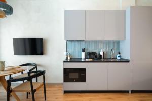 Cuisine ou kitchenette dans l'établissement Limehome Sevilla Calle Pureza