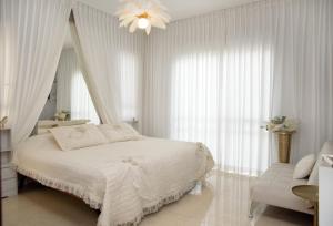 Ένα ή περισσότερα κρεβάτια σε δωμάτιο στο Chill Villa - וילה מדהימה עם בריכה פרטית מחוממת