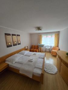 Postel nebo postele na pokoji v ubytování Haus Bellaflora Apartman