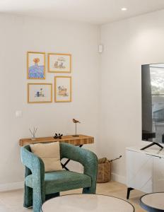 Et tv og/eller underholdning på Molo Residences Boutique Apartments at Senorio