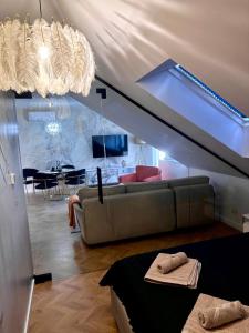 Televisyen dan/atau pusat hiburan di GOLD PTAK Apartment